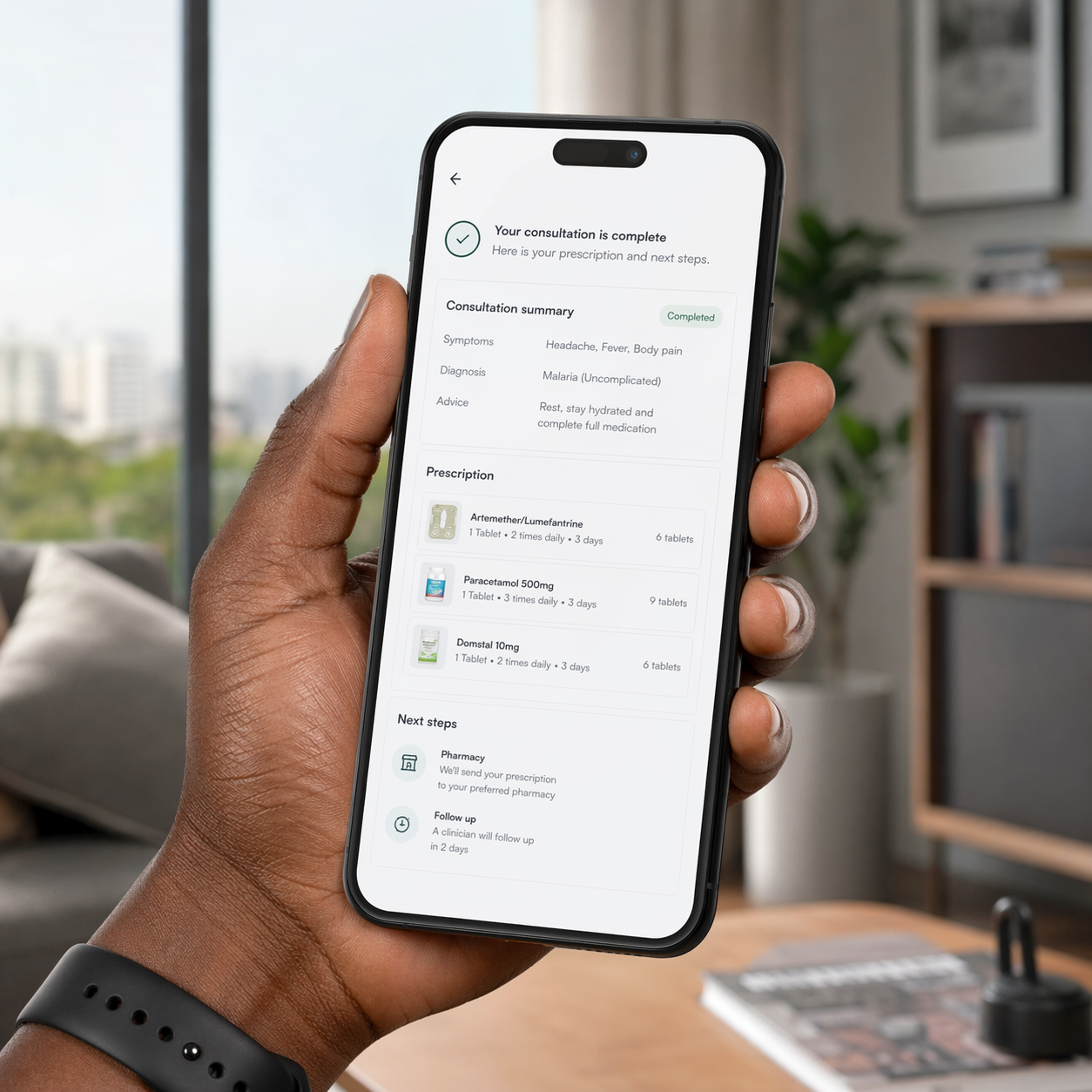 Close-up of a smartphone showing a telemedicine interface with a digital prescription for a Nigerian patient in a modern home setting.